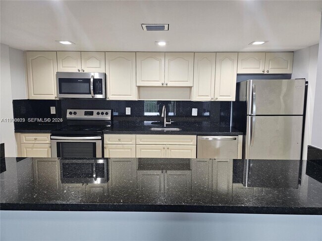 Photo - 6930 Miami Gardens Dr Unit 1-412