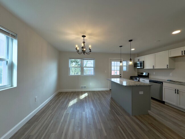 Photo - Spacious 3Bed/2Bath Townhome with Modern Amenities and Outdoor Space in Woodlawn MD