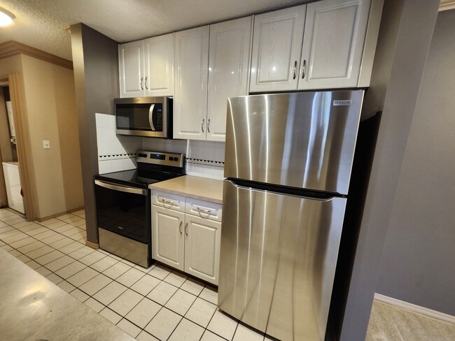 Photo - 727-156 56 Ave SW