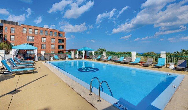 Catch some sun on the pool deck - Evanston Place Apartments