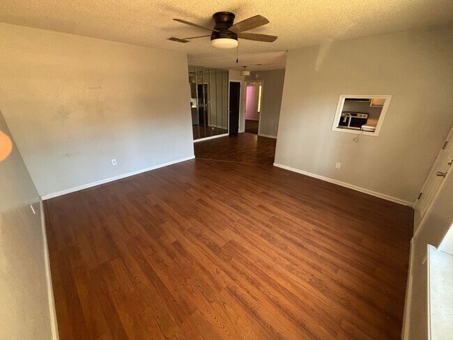 Photo - Spacious 4-Bed, 2-Bath Home with Yard and ...