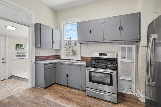 Photo - Charming 2 Bed / 1 Bath Duplex with Private Yard & Off-Street Parking