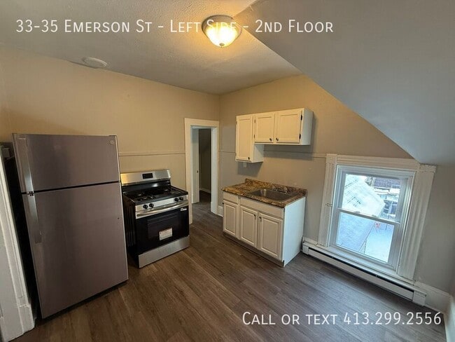 Photo - 33-35 Emerson St-Left Side - 2nd Floor Unit Left Side - 2nd Floor