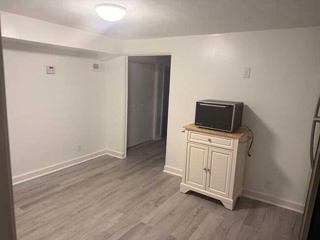 Convection Oven with Kitchen Cart / Doorway to Bedroom - 201 Ridge Ave Unit Ridge Ave