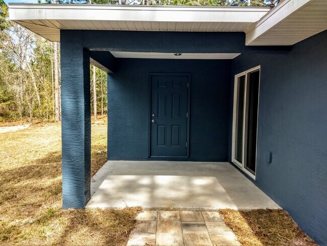 Back Porch and Storage Closet - 9278 N Travis Dr