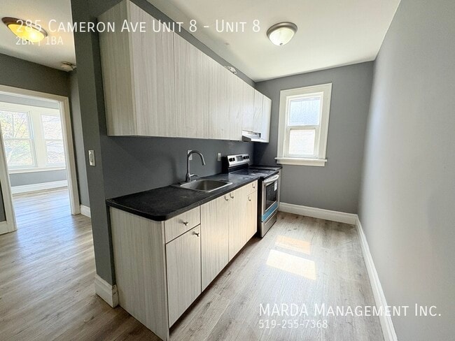 Photo - MODERN 2-BEDROOM/1BATH APARTMENT IN PRIME LOCATION + HYDRO Unité 8
