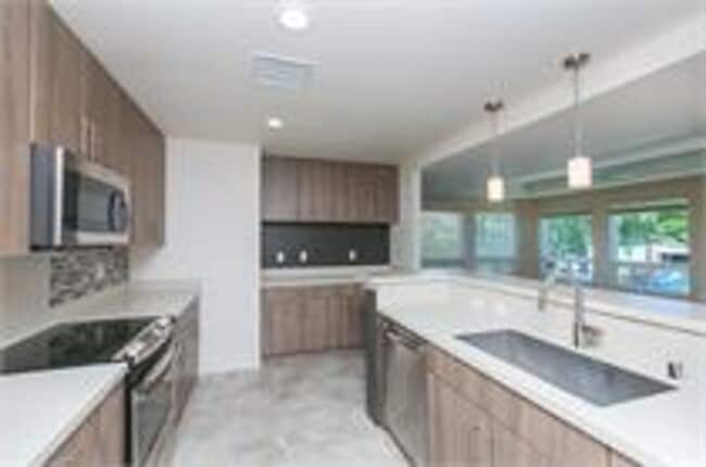 Photo - Live in the Heart of Kailua Town in this rarely available end unit!