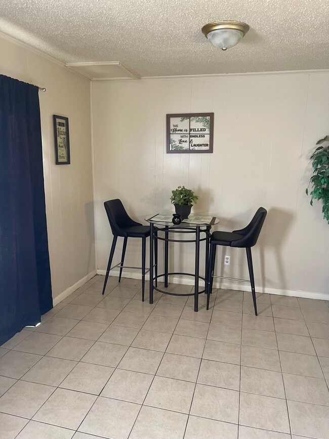 Área de comedor - Villa Nueva Apartments