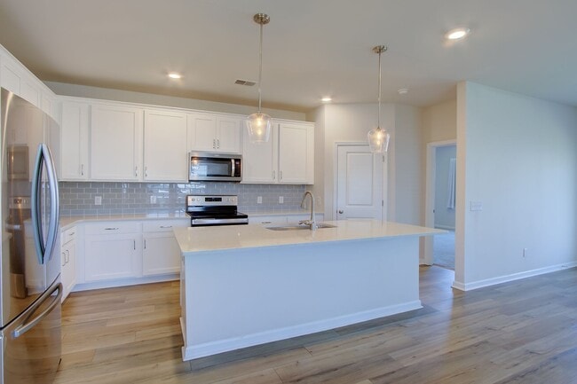 Photo - Spacious 4BR Rental with Stunning Kitchen & Covered Patio