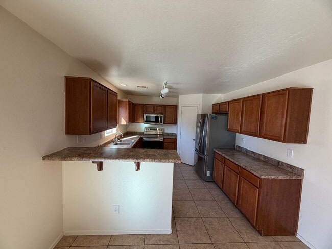 Photo - Large backyard and spacious Goodyear home