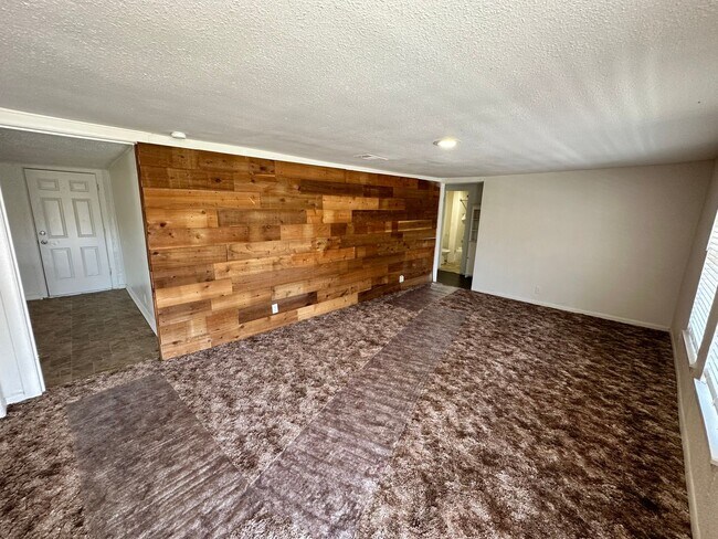 Photo - Charming 3 Bedroom House with Fenced Backyard | Conveniently Located near 820 and W. Camp Bowie