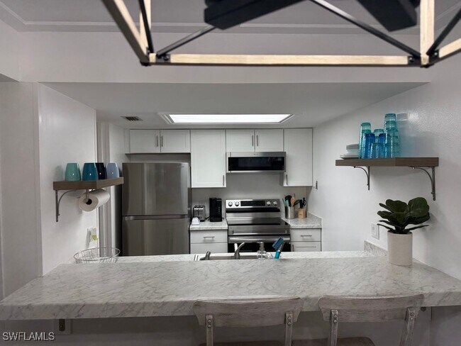 Photo - 2875 Palm Beach Blvd Unidad 206