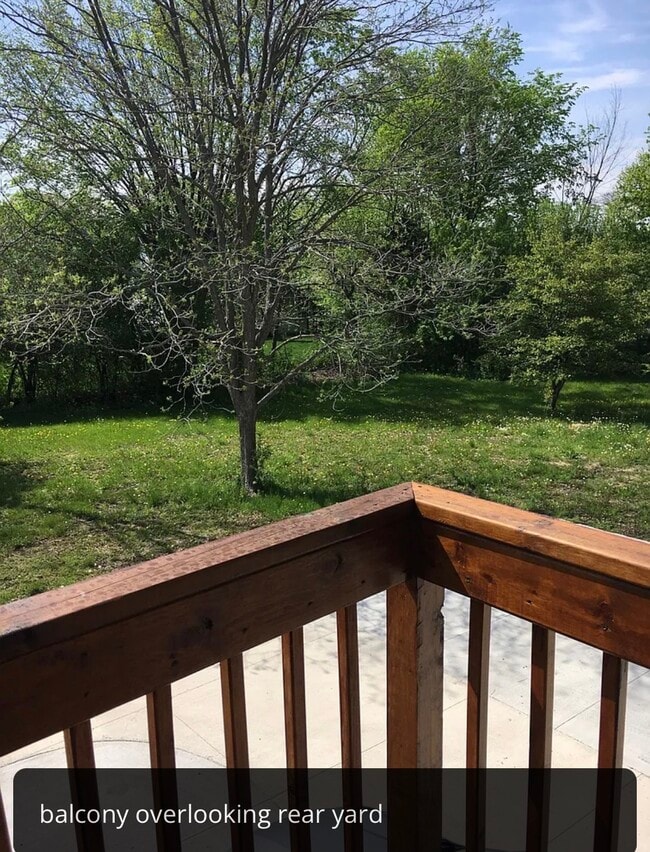 balcony overlooking yard - 2475 E Maple Rd Unit Furnished Penthouse