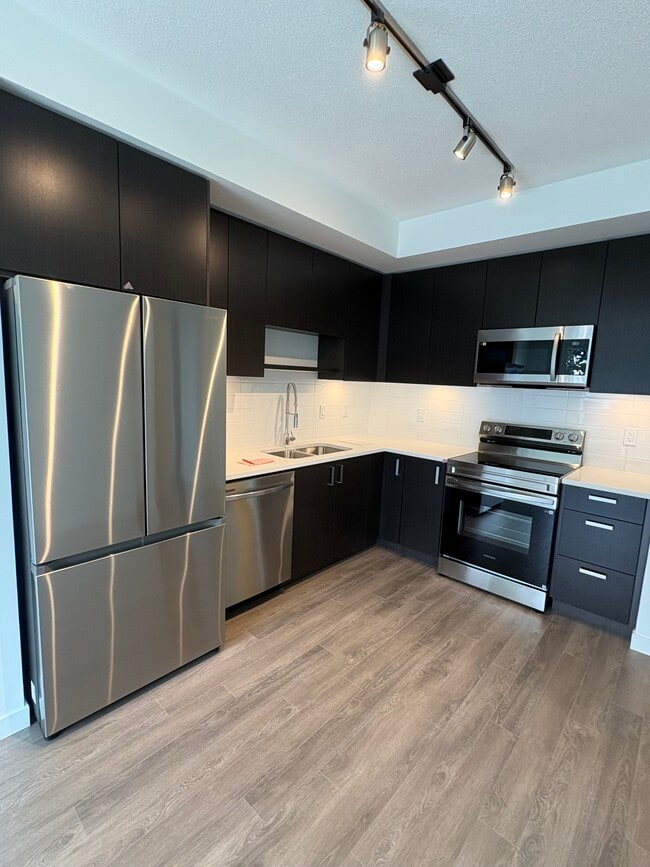 Building Photo - 15735 85 Av Unit 403