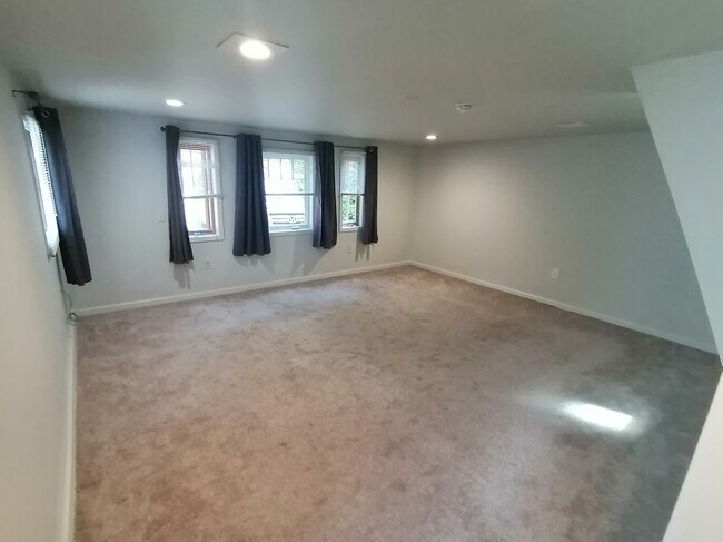 Room updated with vinyl flooring - 11225 Goodwin Way Unit Front Loft