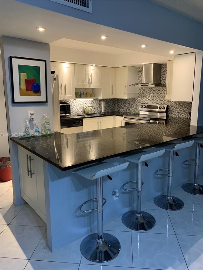 Photo - 501 Three Islands Boulevard Unidad 108