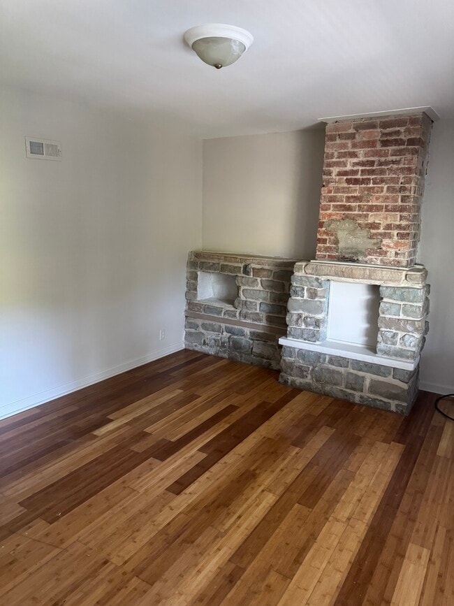 Living Room hardwood floors decorative fireplace - 2808 Banksville Ave