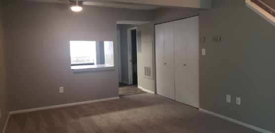 updated townhme living area - Rocky Creek Apartments