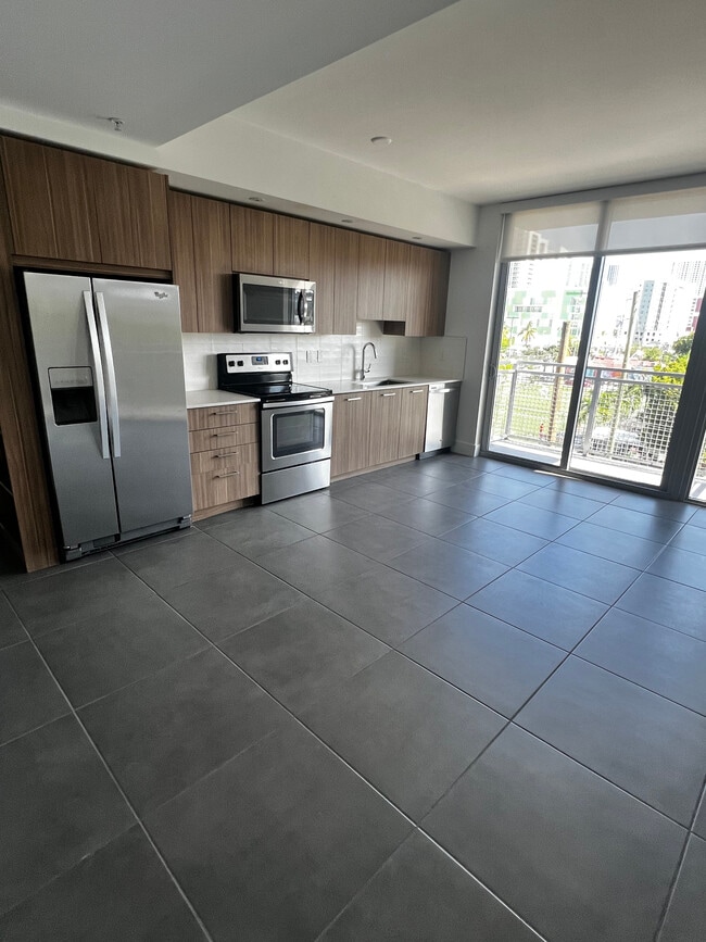 Building Photo - 223 NE 26th Ter Unit A2 Rental