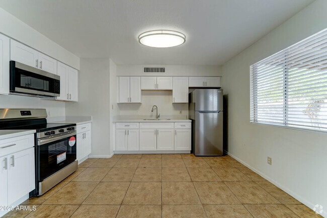 Building Photo - 7816 W Flower St Rental