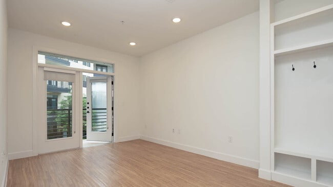 Living Room with Balcony and Hard Surface Flooring