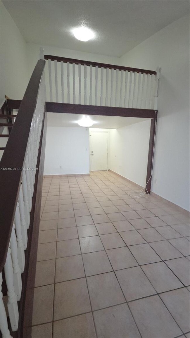 Building Photo - 9437 Fontainebleau Blvd Unit 202