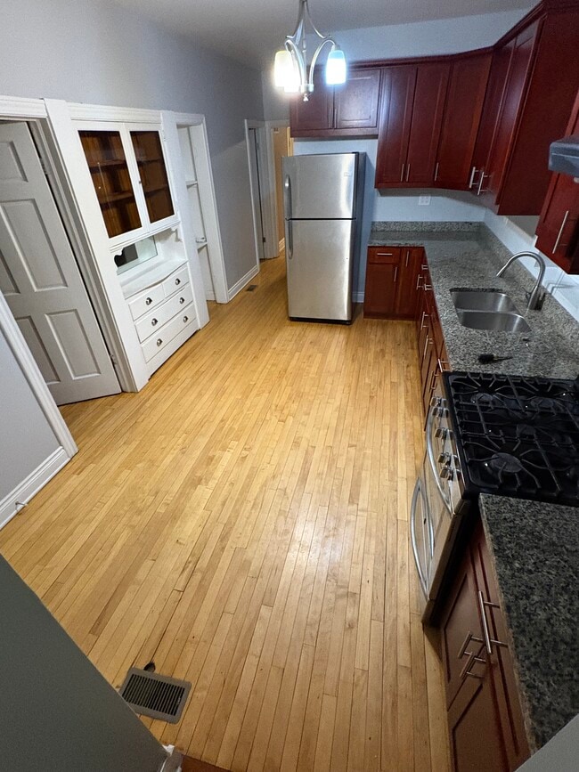 Building Photo - 4622 S Troy St Unit 1