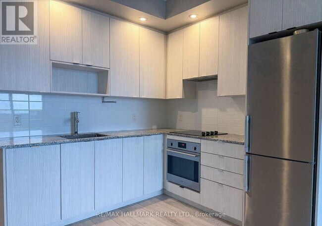 Photo - 225 Village Green Square Unit 605