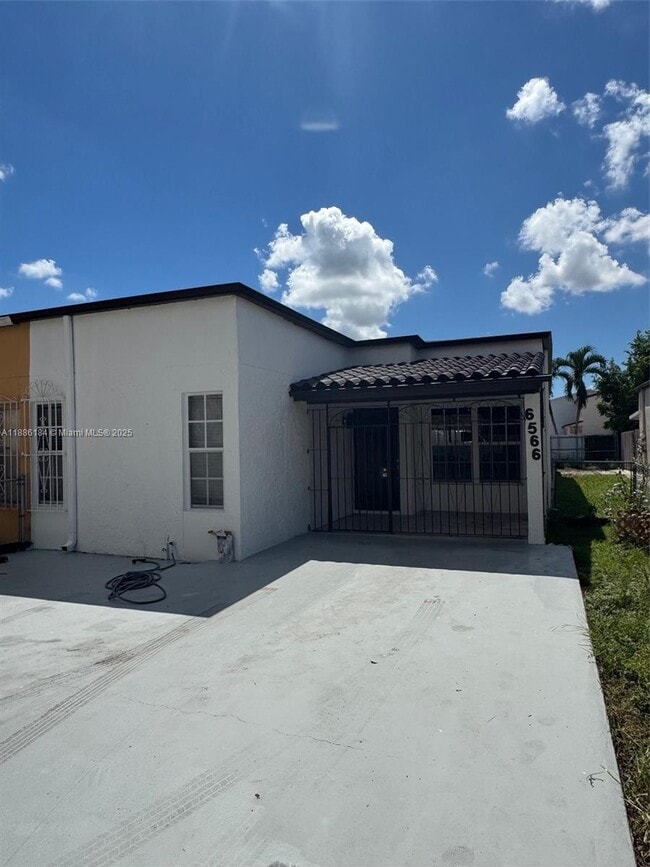 Building Photo - 6566 W 2nd Ct Unit 18