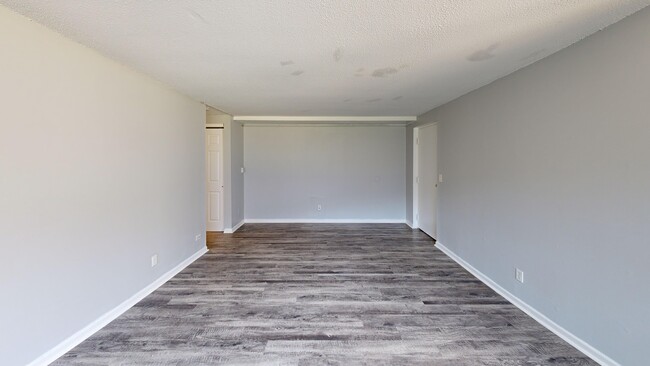 2 BR, BBA - 866 SF - Living Room - Chili Garden Apartments