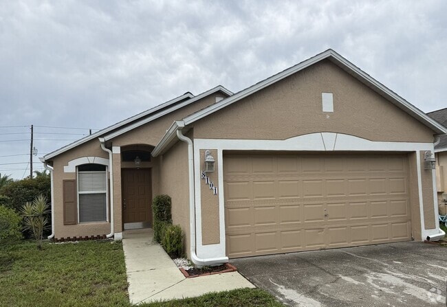 Building Photo - EAST ORLANDO: 3 bed/2 bath, 2 Car Garage A... Rental