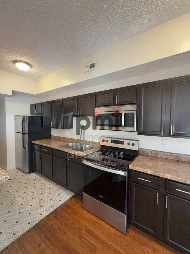 Building Photo - 1 W 28th St Unit 208