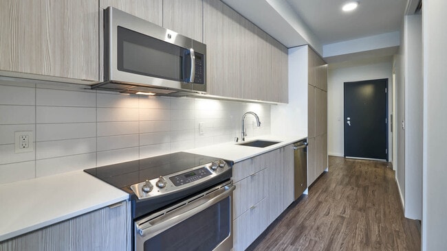 Kitchen with Stainless Steel Appliances - Venn at Main