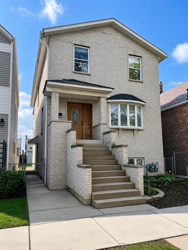 Building Photo - 5309 30th Pl Unit 2