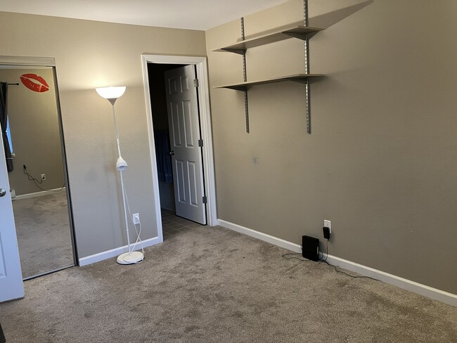 main bedroom (include built-in shelving) - 9370 SW 146th Ter Condo Unit 7