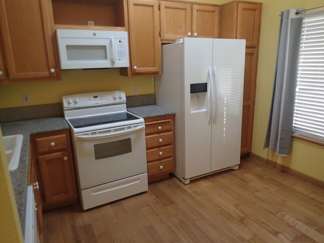 Photo - Beautiful single family home with 2 car garage and metal building storage