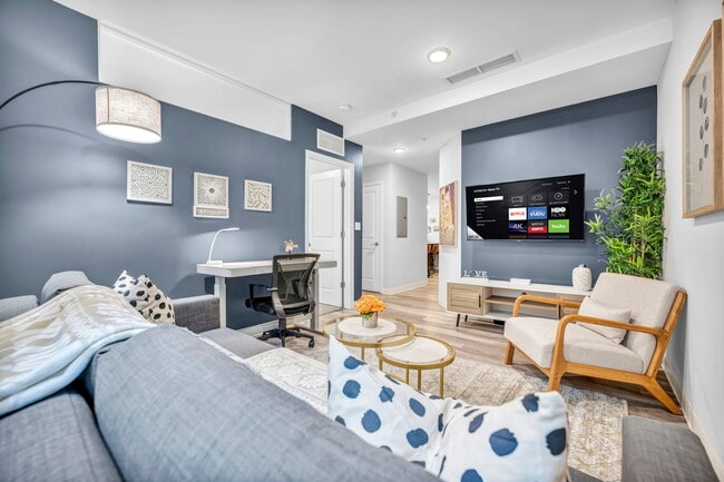 1BR, 1BA - 587SF - Living Room - The Athlon Rental