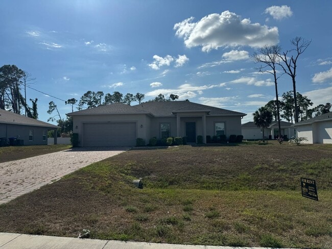 Photo - 3 Bed + Den with 2 Baths & 2 Car Garage