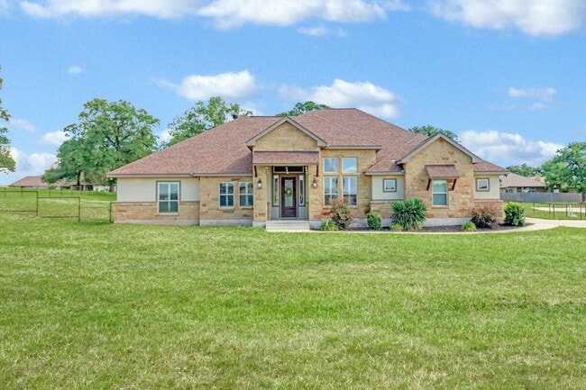 Building Photo - "Charming 4-Bed Oasis with Granite Touches & Cozy Fireplace in Floresville!"