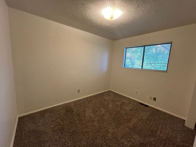 Photo - Beautiful Split-Level 6BR Home with Attached Garage and Fenced Yard +$300 Off First Month!