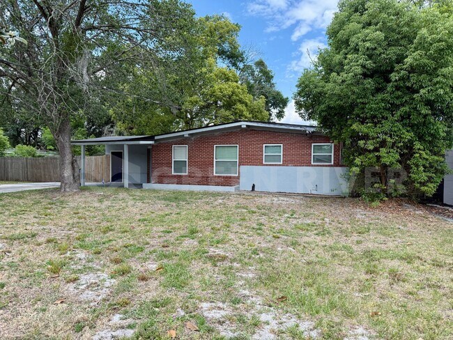 Photo - Fully Renovated 2BR Brick Home with Vaulted Ceilings & Backyard Retreat!
