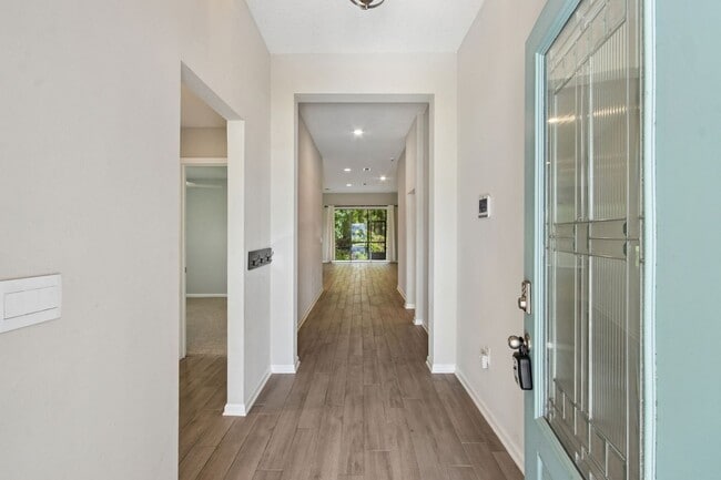 Photo - Modern 4BR Home with 3 Full Baths in River Glen | Screened Porch & Resort-Style Amenities