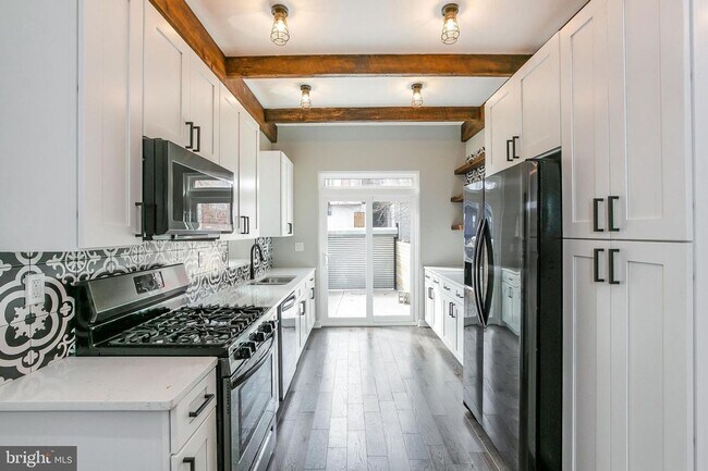 Photo - Gorgeously renovated classic row home with Off-Street Parking