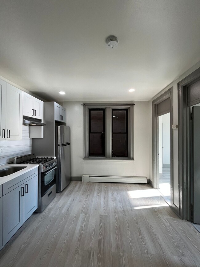 Building Photo - 836 Communipaw Ave Unit 1F