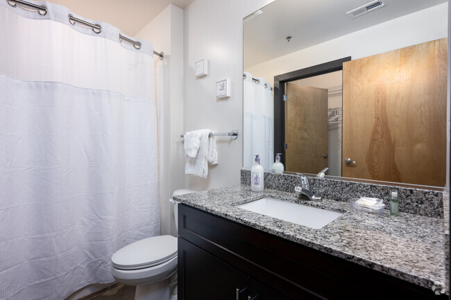 2BR, 2BA - 1061SF - Primary Bathroom - May Hosiery Lofts