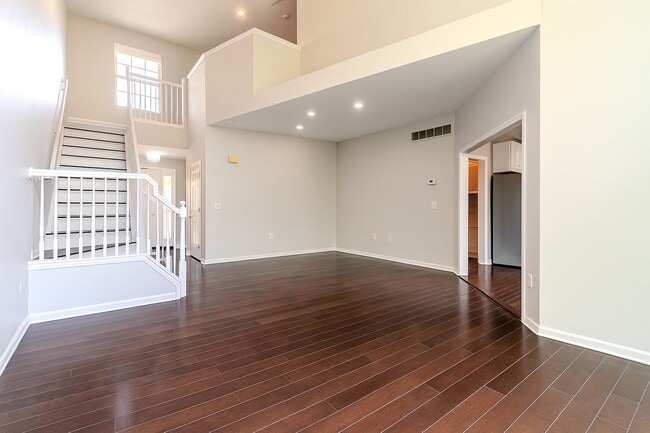 Photo - Stunning 2BR/2.5BA Townhouse with Dual Primary Suites, 2-Car Garage & Bonus Loft