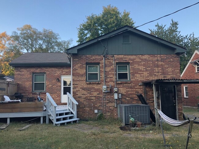 Back of house - door under the awning is basement door for Unit A storage - 405 Patterson Street