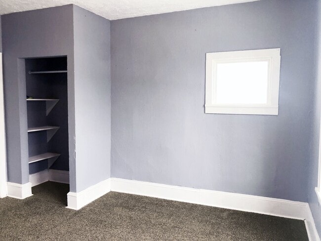 Building Photo - 3206 W 50th St Unit Down