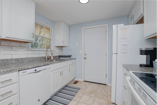 Photo - Inviting home with private fenced yard for pets
