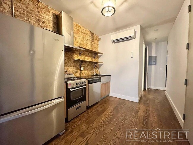 Photo - True 3 Bedroom layout — no flex, no railroad - Massive full-floor basement with second private entra Unit 2L